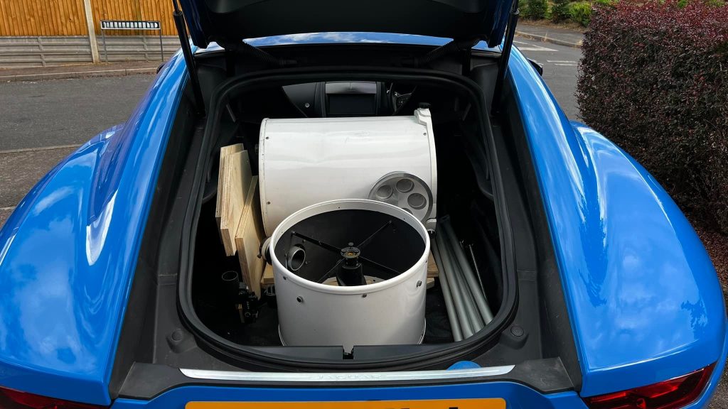 The 12″ Meade Lightbridge and chipboard base packed in the boot of the blue Jaguar F-Type